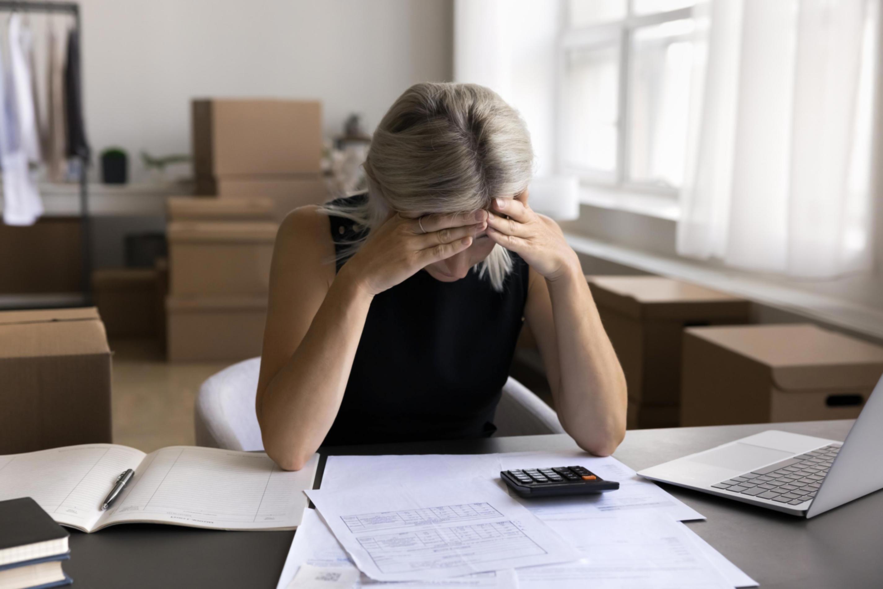 System administrator working on server configuration with documentation references